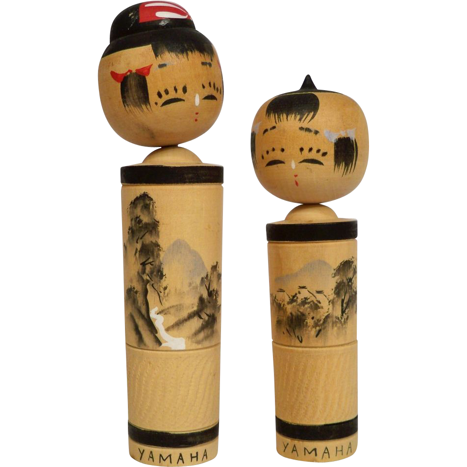 A set of kokeshi dolls.